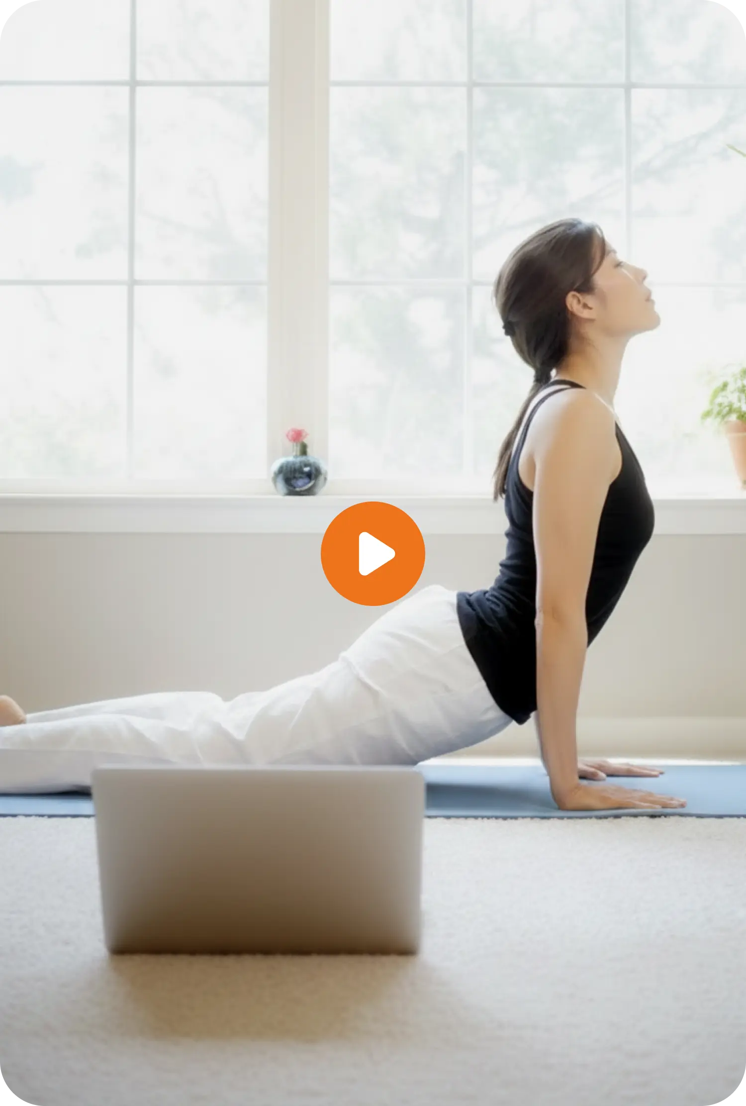 Woman starting her personalized yoga journey with MyYogaTeacher from home